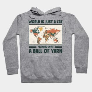 Funny crochet saying |  World is just a cat playing with a ball of yarn Hoodie